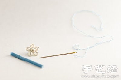 紐扣+松緊帶 DIY手工制作可愛(ài)小花戒指 -  itrip.net.cn