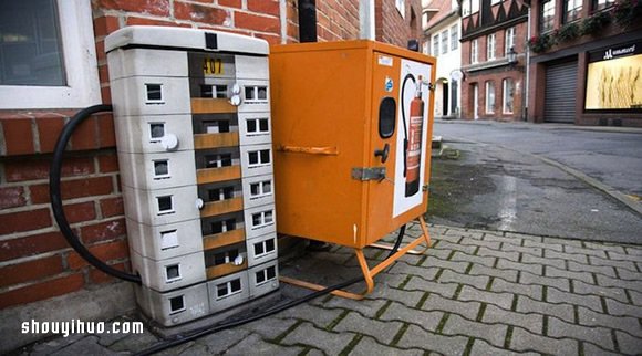 水泥墩和電箱都變房子 迷你建筑涂鴉美化環(huán)境 -  itrip.net.cn