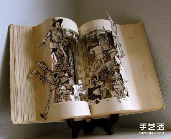 經(jīng)典書籍上的雕塑作品 藝術(shù)般的立體紙雕圖片 -  itrip.net.cn
