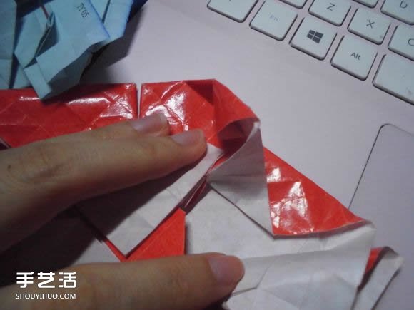 接吻魚愛心折紙圖解 超復(fù)雜桃心的折法過程 -  itrip.net.cn