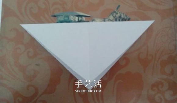 最簡單元寶的疊法圖解 怎么折紙?jiān)獙毜姆椒?-  itrip.net.cn