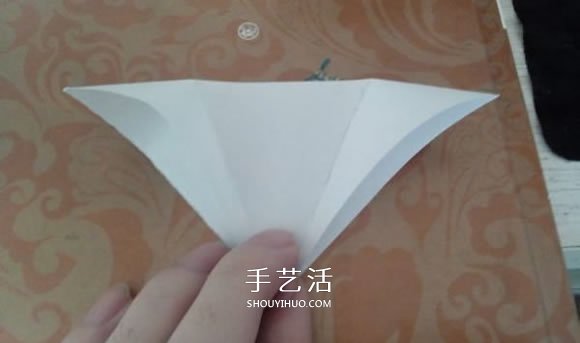 最簡單元寶的疊法圖解 怎么折紙?jiān)獙毜姆椒?-  itrip.net.cn