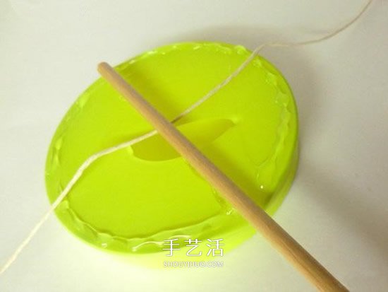 簡(jiǎn)易撥浪鼓的制作方法 手工撥浪鼓的做法圖解 -  itrip.net.cn