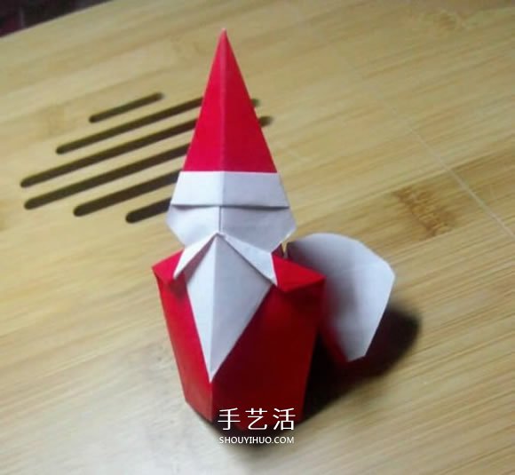背著麻袋的可愛圣誕老人手工折紙圖解教程 -  itrip.net.cn