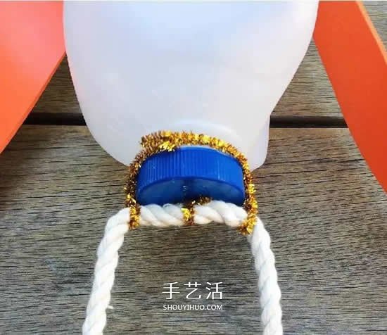 瓶蓋機(jī)器人的制作方法 廢物利用做機(jī)器人圖解 -  itrip.net.cn
