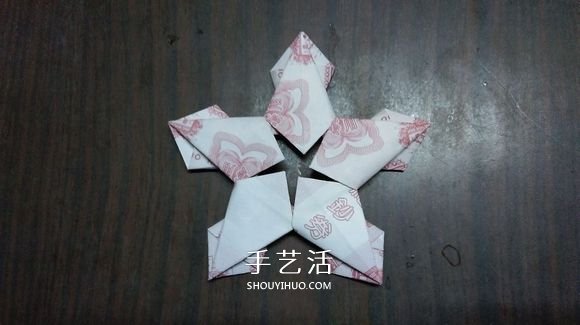 五瓣蓮的折紙方法圖解 紙幣折五瓣蓮的步驟 -  itrip.net.cn