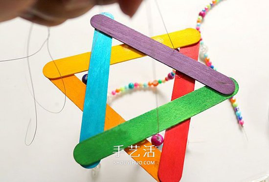 自制雪糕棍風(fēng)鈴的方法 簡易手工風(fēng)鈴制作教程 -  itrip.net.cn