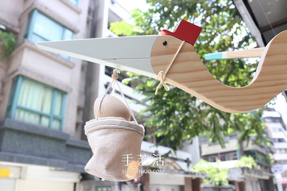 手工制作木頭玩具送子鳥 拉下拉環(huán)扇動翅膀飛行 -  itrip.net.cn