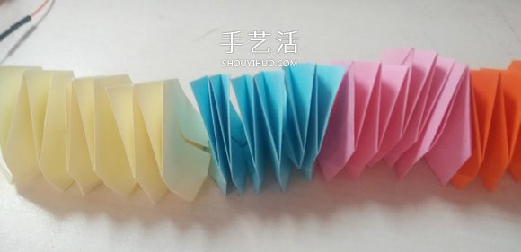 可以隨意翻內(nèi)翻外！變換紙花球折紙方法圖解 -  itrip.net.cn