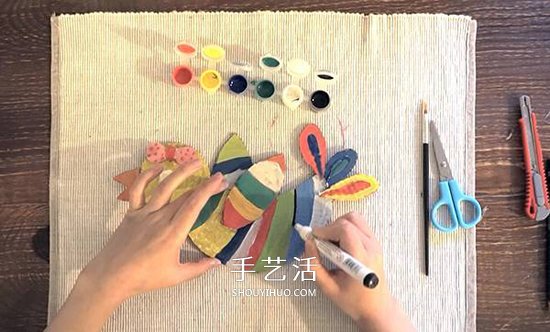 幼兒園硬紙板廢物利用 手工做一只多彩的小鳥 -  itrip.net.cn