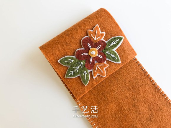 剪兩塊氈布縫一下 自制飾花筆袋的教程 -  itrip.net.cn