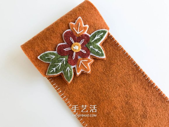剪兩塊氈布縫一下 自制飾花筆袋的教程 -  itrip.net.cn