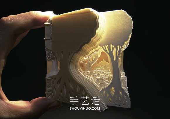 由數(shù)十張紙制作而成的立體城市和森林紙雕 -  itrip.net.cn