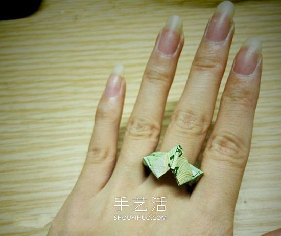 如何用紙幣折戒指愛心的方法步驟圖解教程 -  itrip.net.cn